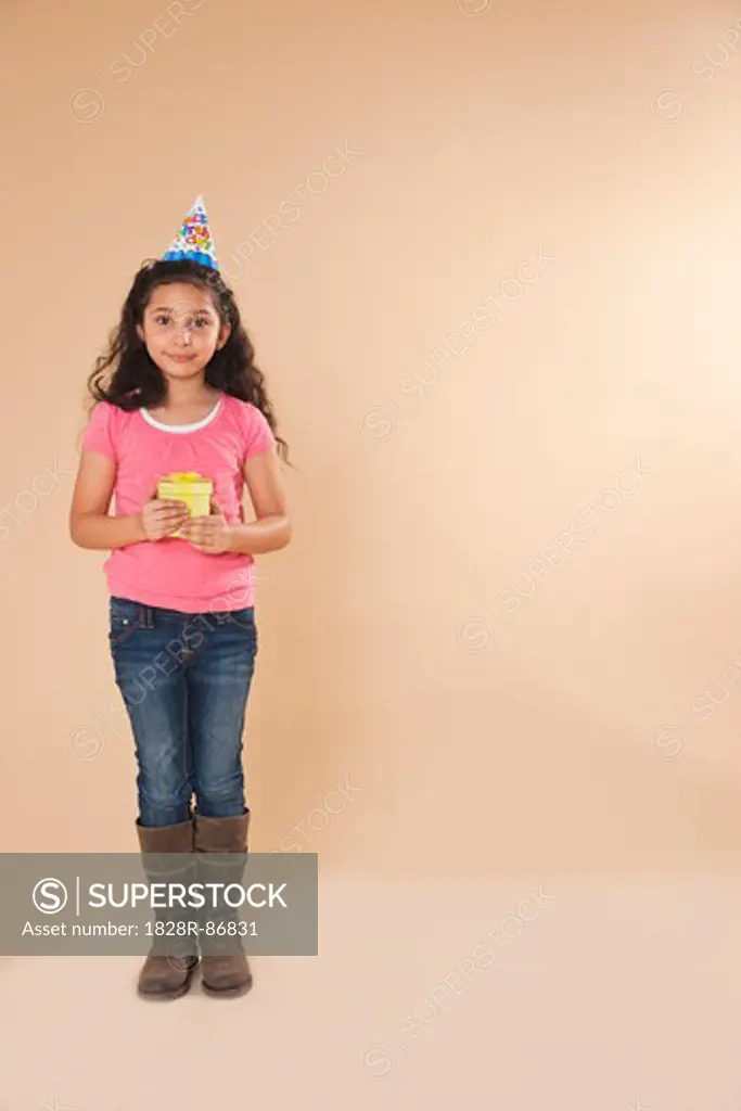 Portrait of Girl Holding Gift