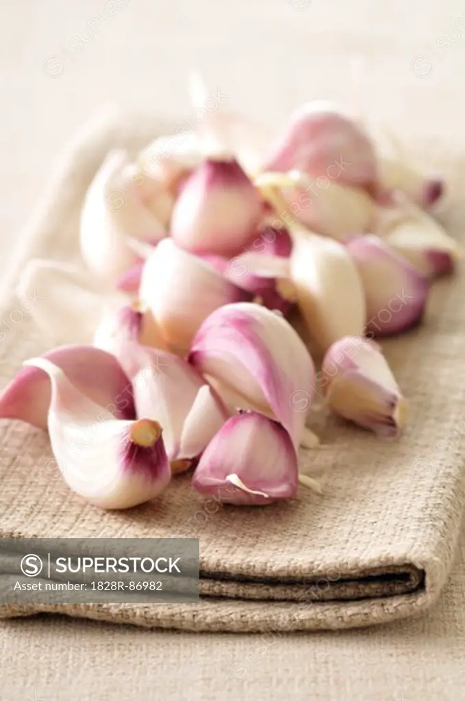 Close-up of Garlic Cloves on Cloth Napkin