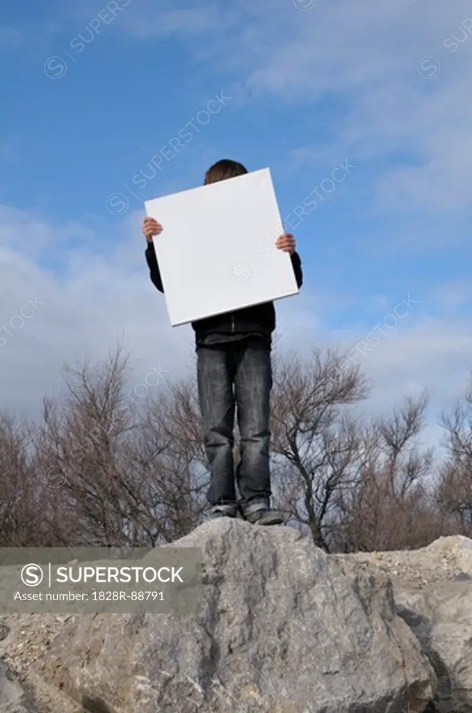 Boy Holding Blank Canvas, Sete, France