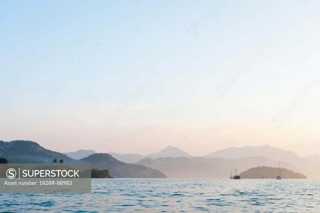 Scenic View of Mountains and Boats near Paraty, Costa Verde, Brazil