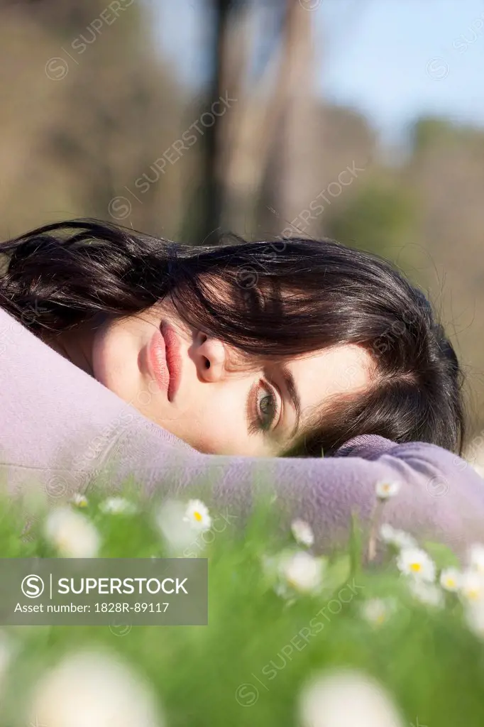Close-up of Woman Lying in Grass