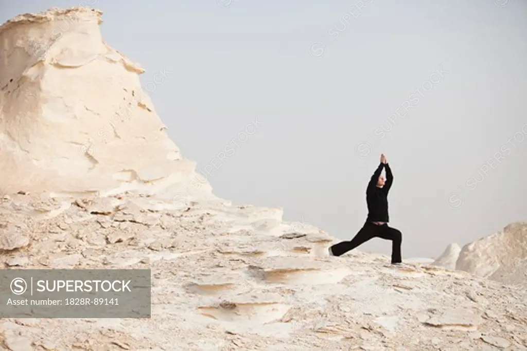 Woman doing Yoga, White Desert, Farafra, Egypt