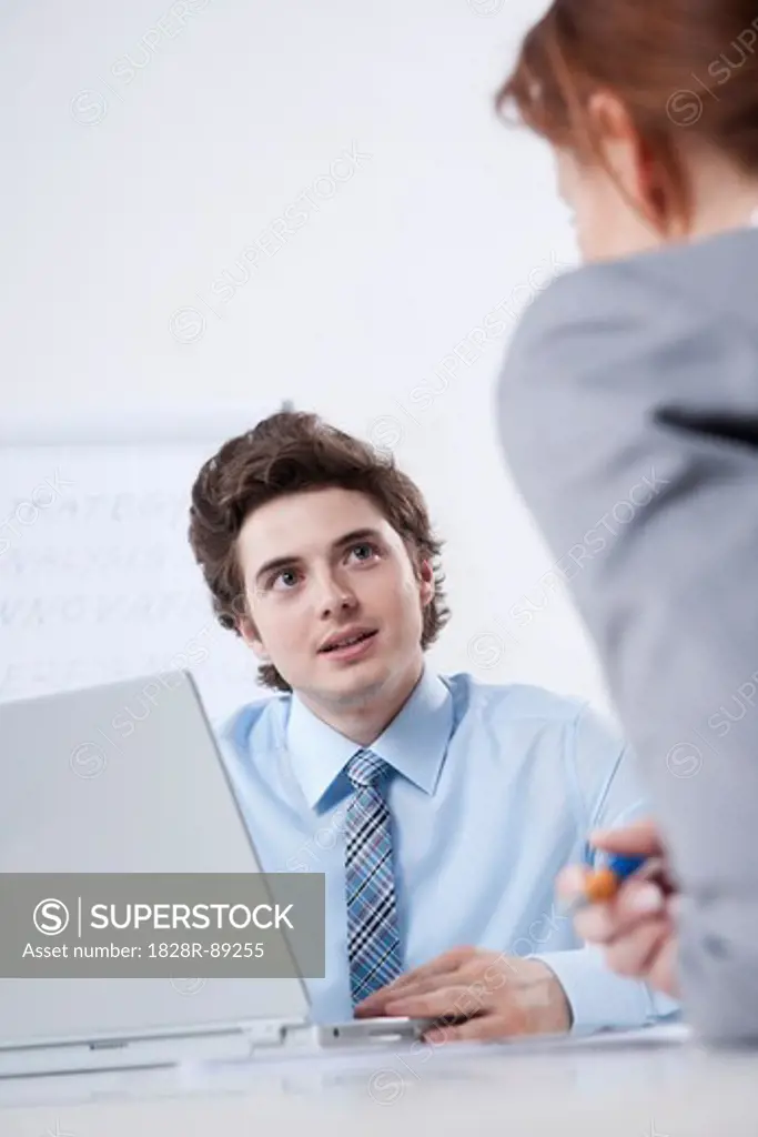 Young Businessman Meeting with Businesswoman