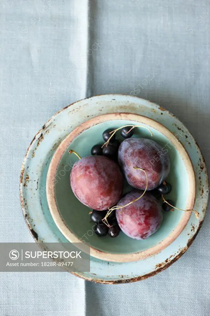 Plums and Black Currants in Bowl