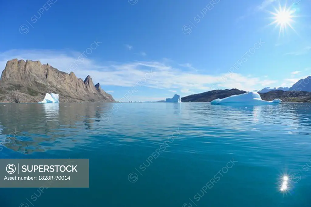 Iceberg and Bjorn Oer Mountain, Scoresbysund, Greenland