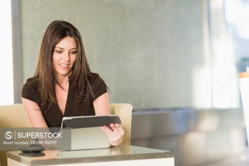 Woman Using Tablet Computer, Florida, USA