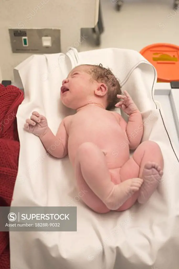 Newborn Baby in Delivery Room   