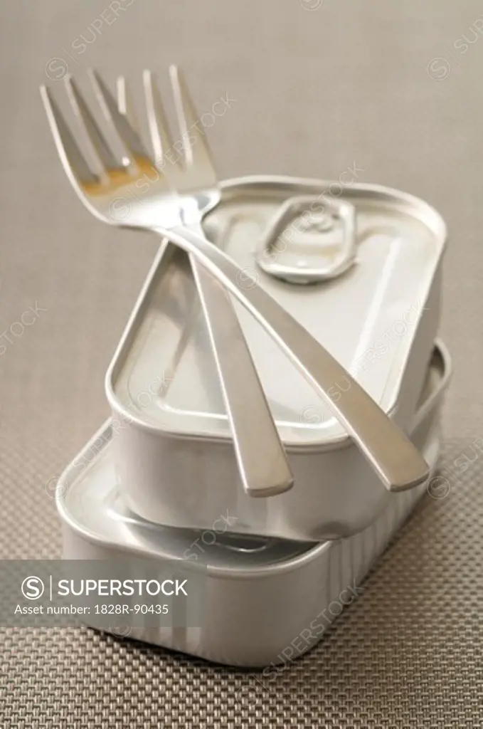 Forks and Tins of Food