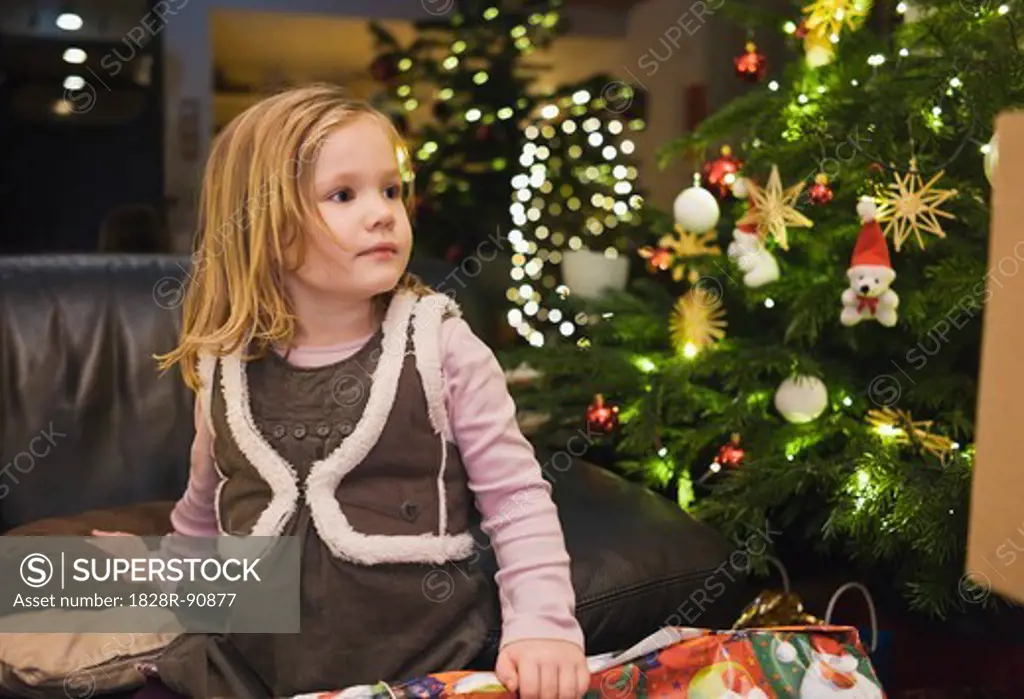 Girl on at Home with Christmas Tree, Germany