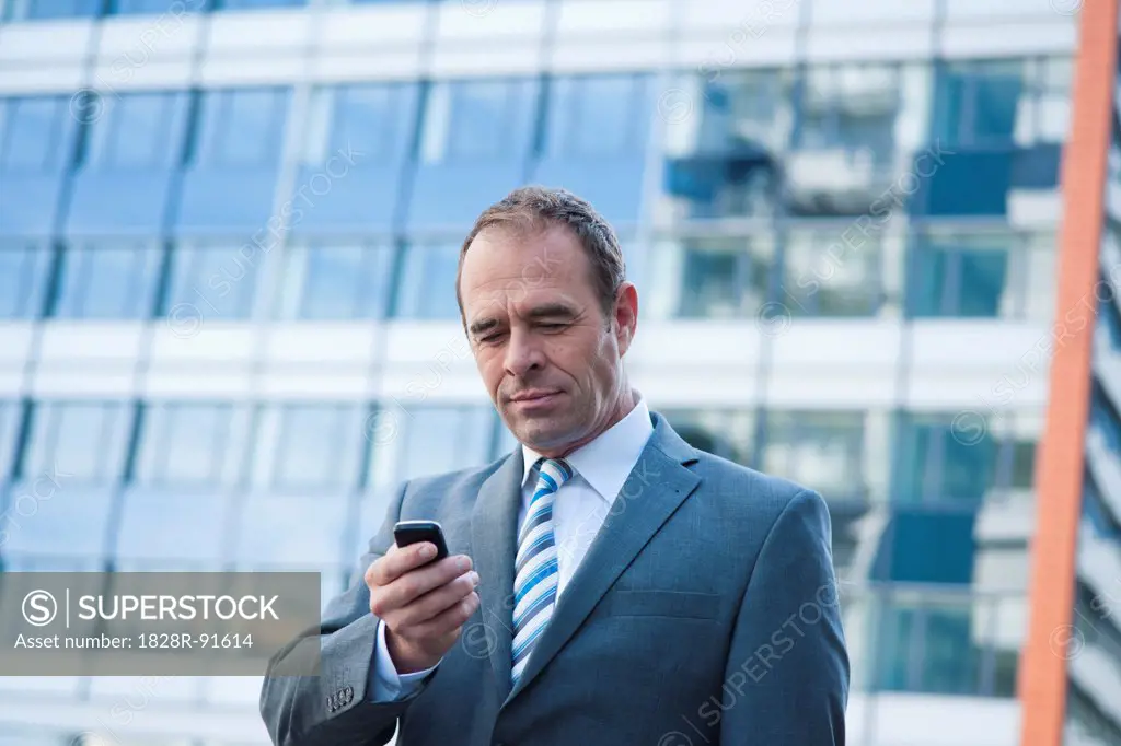 Businessman using Cell Phone, Niederrad, Frankfurt, Germany