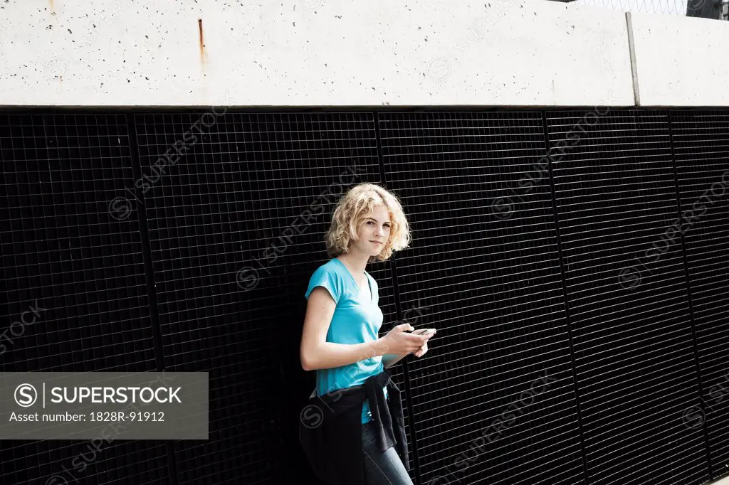 Girl Holding Tablet in Playground, Mannheim, Baden-Wurttemberg, Germany