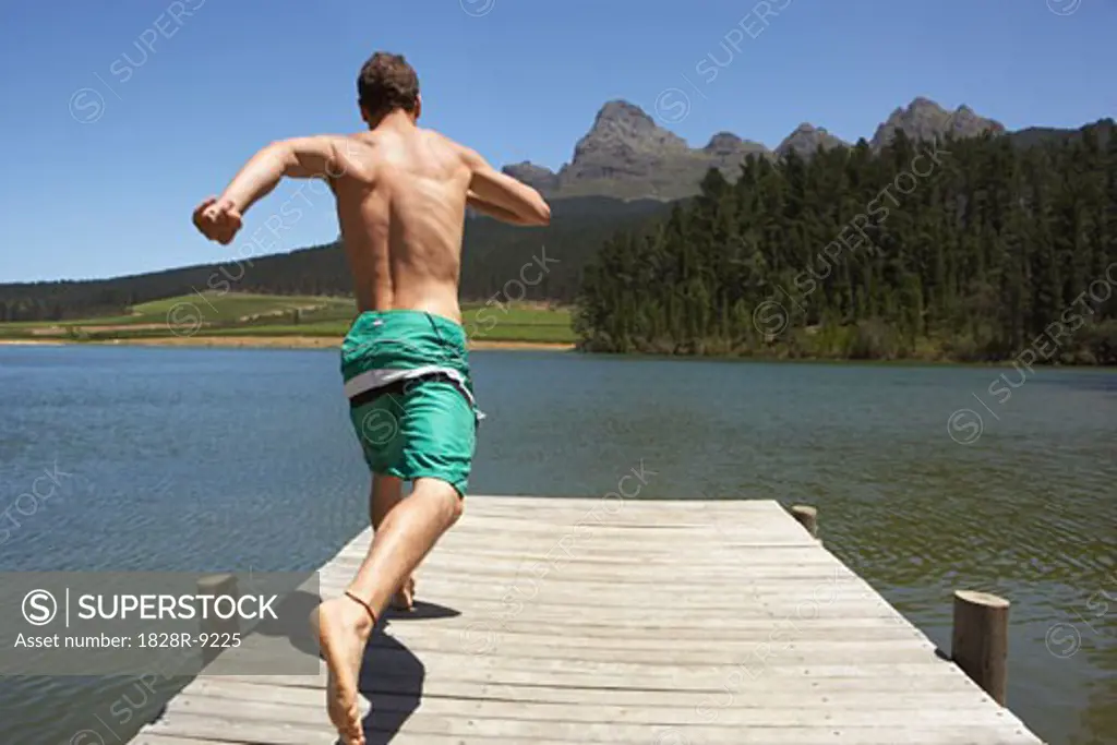 Man Running on Dock   
