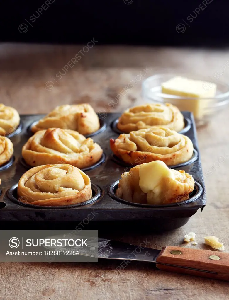 Garlic Dinner Rolls in Muffin Tin with Butter
