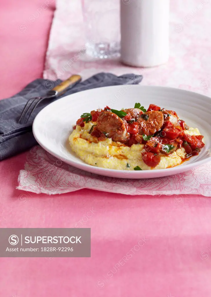 Sausage with Tomatoes on Polenta