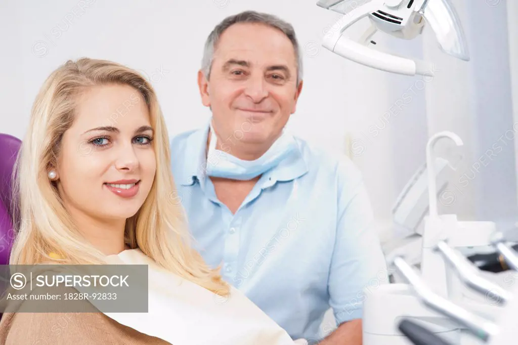 Portrait of Young Woman and Dentist in Dentist's Office, Germany