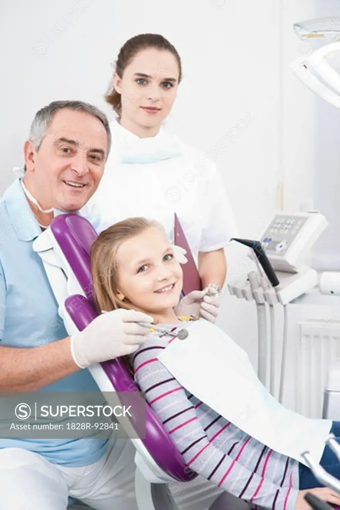 Portrait of Dentist, Hygienist and Patient in Dentist's Office, Germany