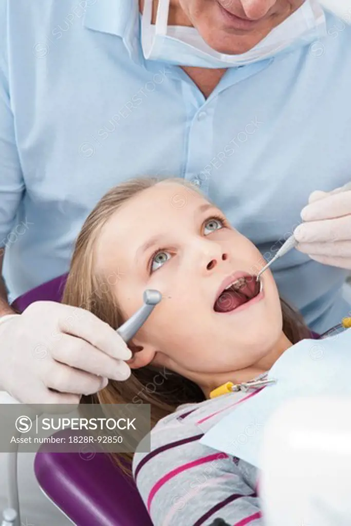 Dentist Checking Girl's Teeth at Appointment, Germany