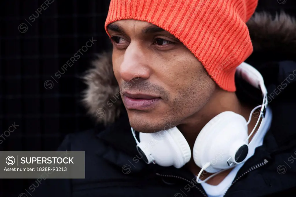 Portrait of Man Outdoors with Headphones on his Neck, Mannheim, Baden-Wurttemberg, Germany
