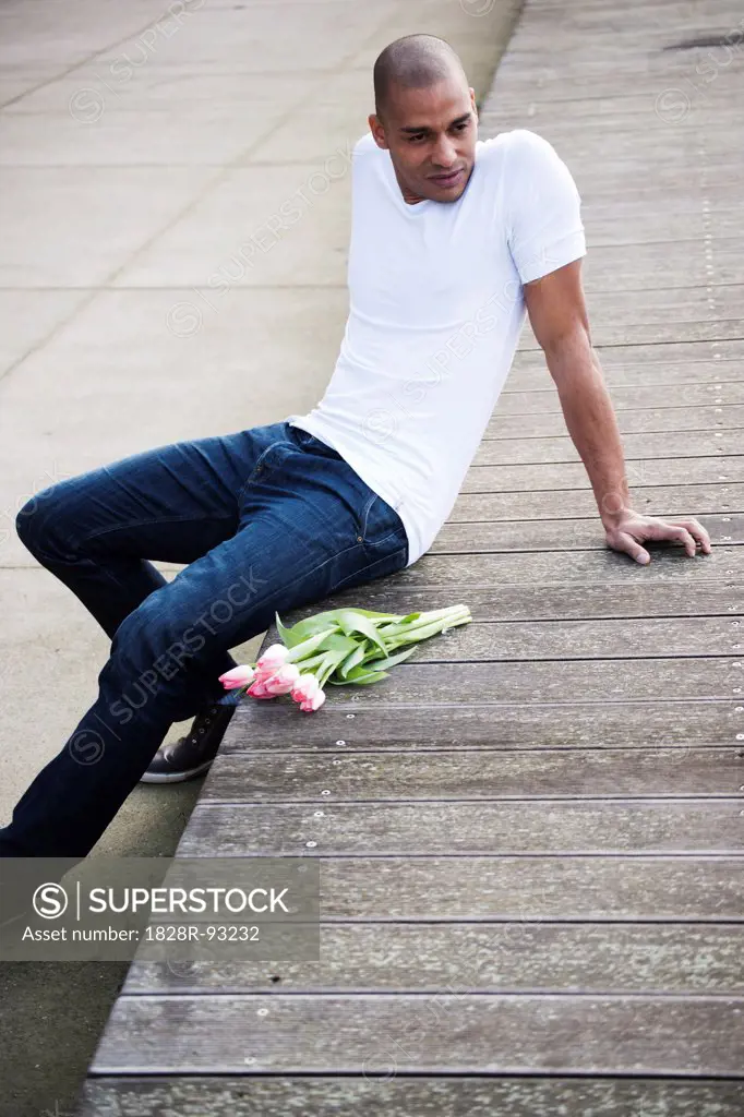 Portrait of Man Outdoors with Bouquet of Tulips, Mannheim, Baden-Wurttemberg, Germany