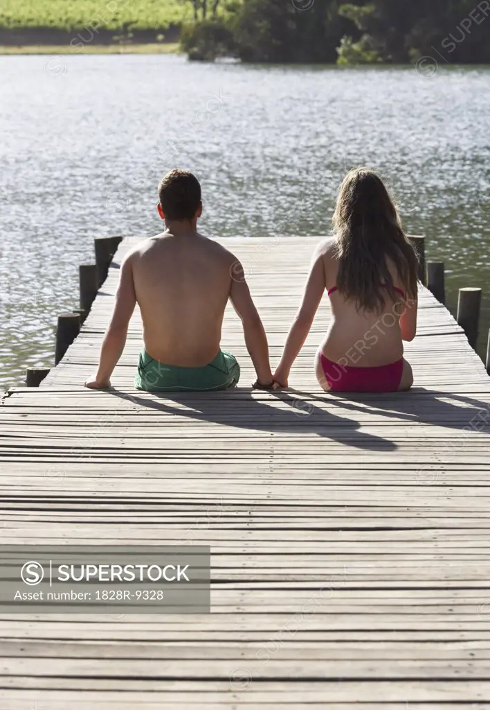 Couple Sitting on Dock   