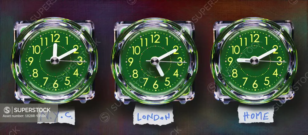 Panoramic of Three Plastic Clocks Showing Time Zones, Studio Shot