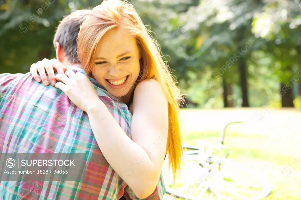 Young Couple Hugging in Park on a Summer Day, Portland, Oregon, USA
