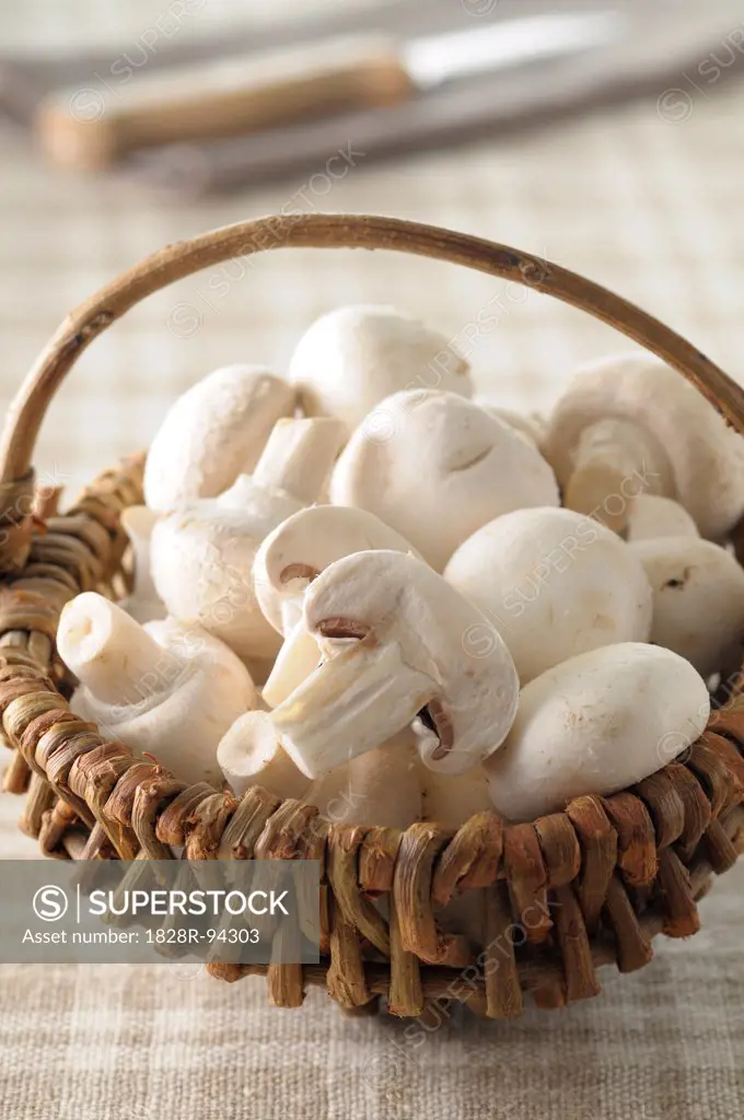 Close-up of Basket with Button Mushrooms