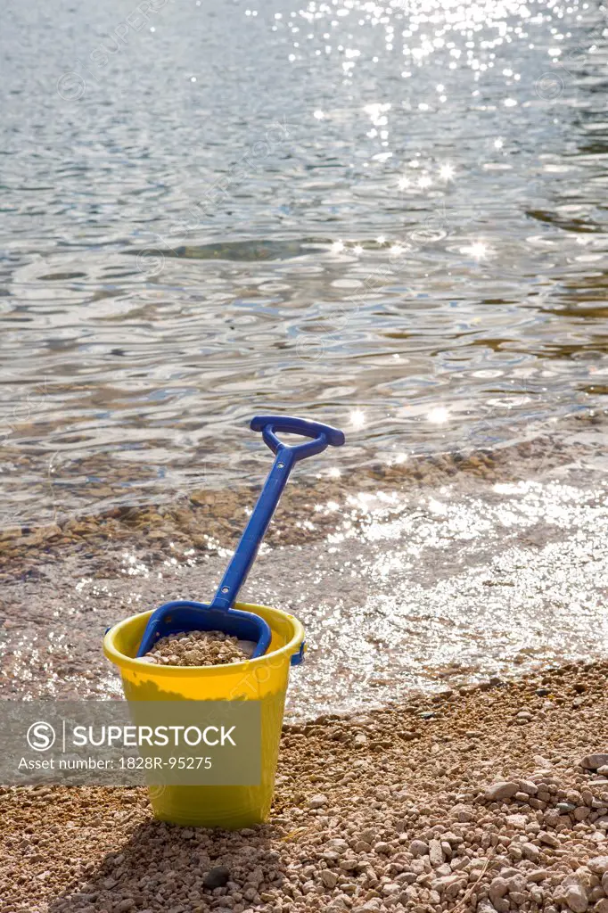 Shovel and bucket on the shore, Okanagan Valley, British Columbia, Canada