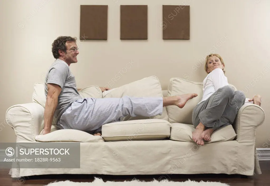 Couple Arguing on Sofa   