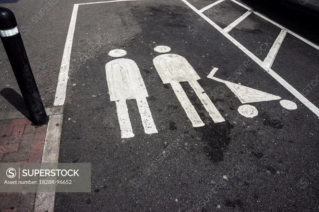 Parking Spot with Family Parking Only Symbol in Supermarket Parking Lot, London, England,08/11/2012