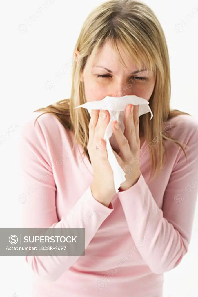 Woman Blowing Her Nose   