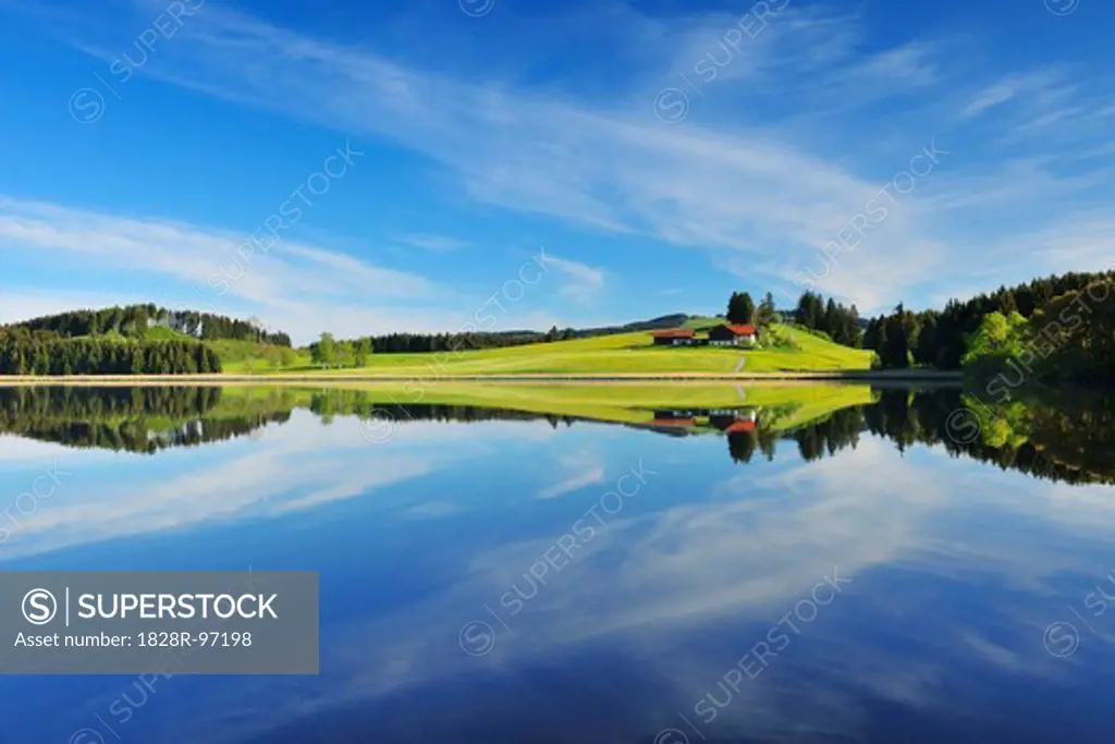 Landscape and Sky Reflecting in Lake, Sameister Weiher, Rosshaupten, Bavaria, Germany,05/10/2012