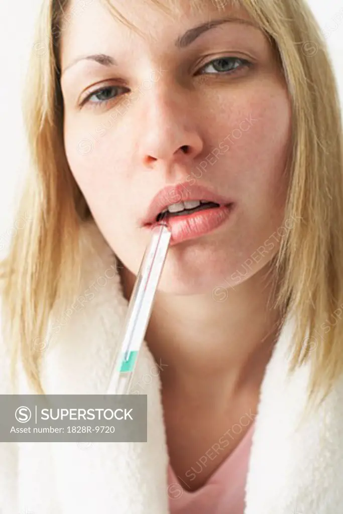 Woman Taking Her Temperature   