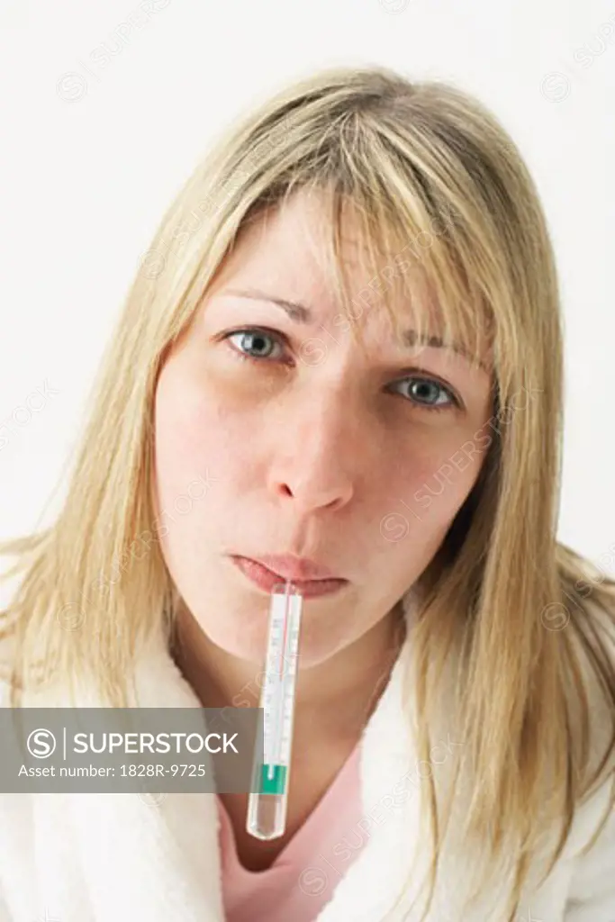 Woman Taking Her Temperature   