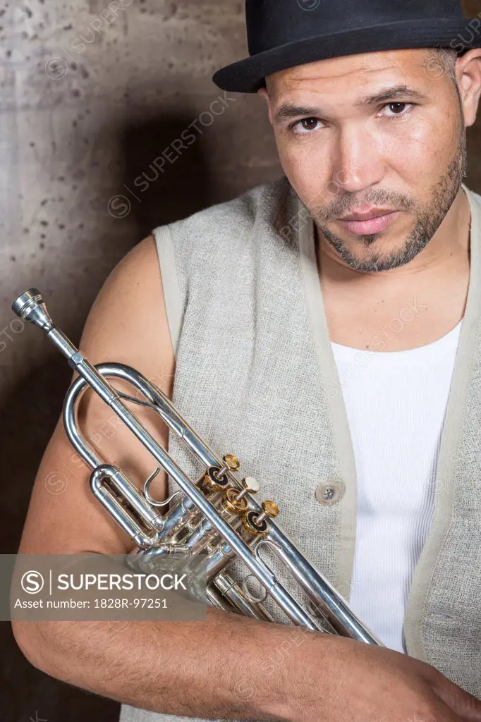 Portrait of Musician holding Trumpet, Studio Shot,05/28/2013