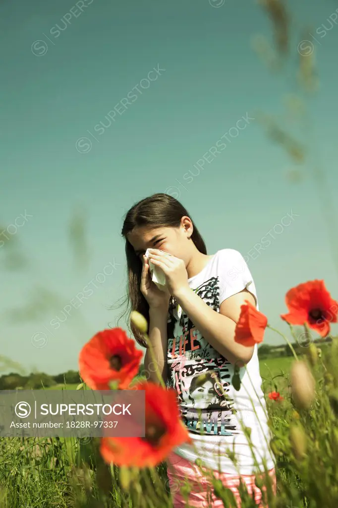 Girl having Allergic Reaction to Plants, Mannheim, Baden-Wurttemberg, Germany,06/08/2013