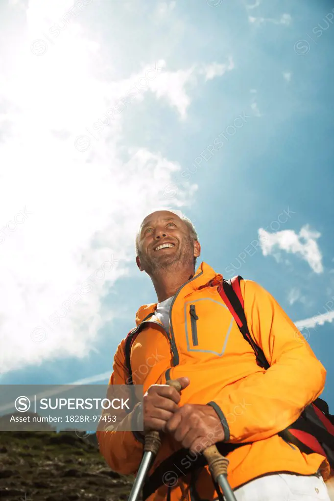Portrait of mature man hiking in mountains, Tannheim Valley, Austria,06/15/2013