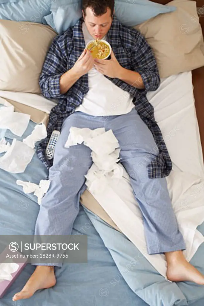 Man Sick in Bed   