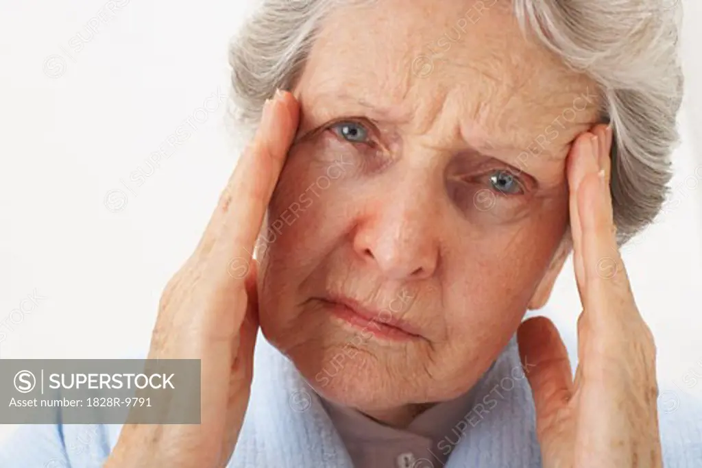 Woman Suffering from Headache   
