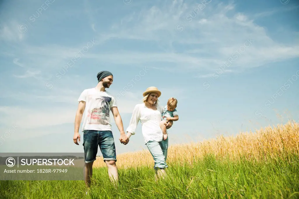 Family Walking by Agricultural Field, Mannheim, Baden-Wurttemberg, Germany,07/14/2013
