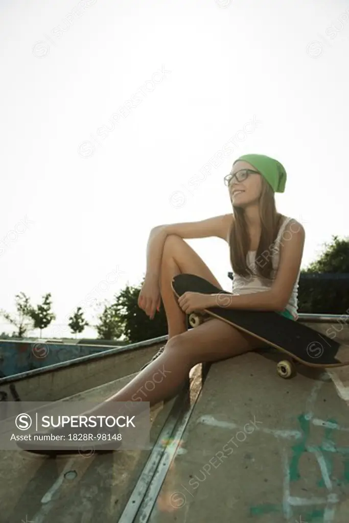 Teenage Girl Hanging out in Skatepark, Feudenheim, Mannheim, Baden-Wurttemberg, Germany,07/10/2013