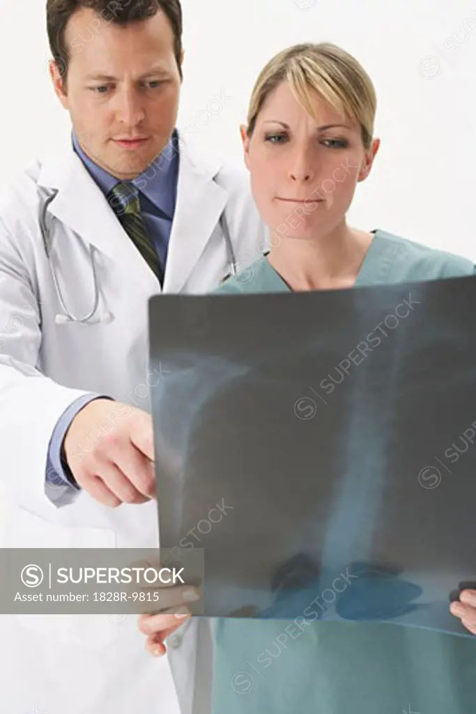 Portrait of Doctors Looking at X-Ray   