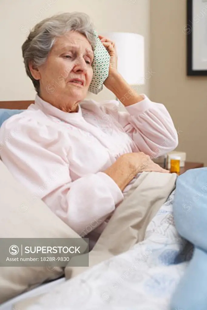 Portrait of Woman Using Ice Pack   