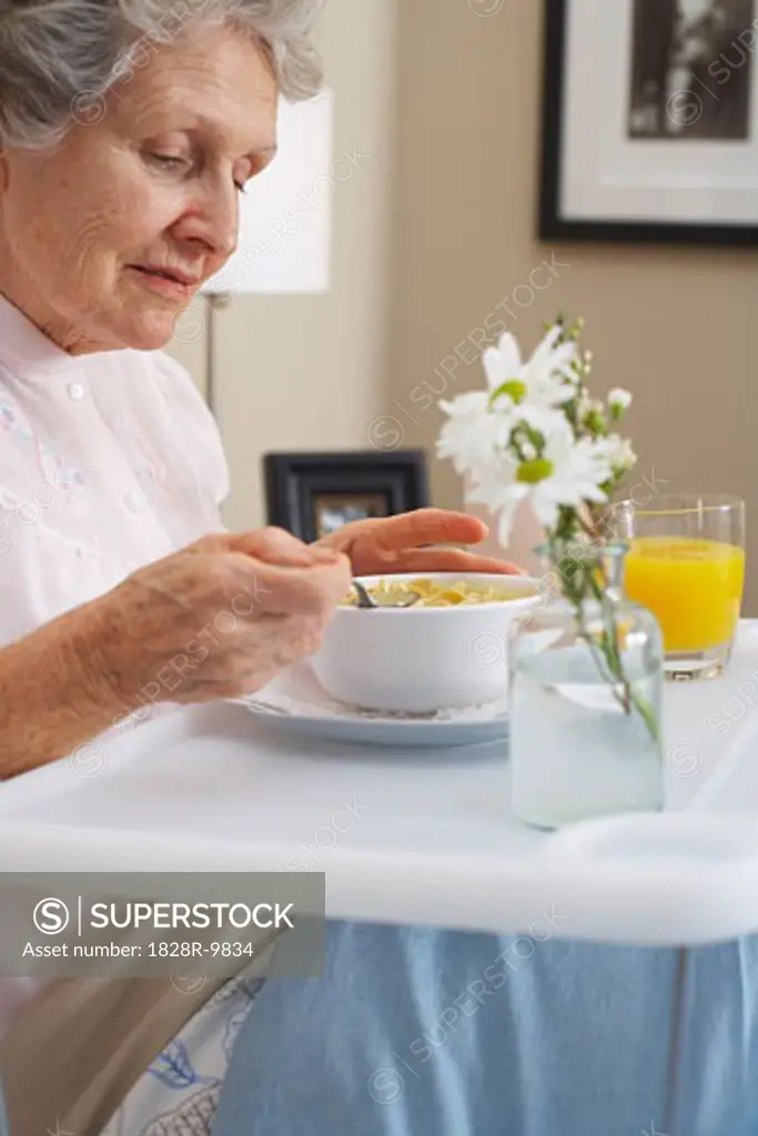 Woman Eating Soup   