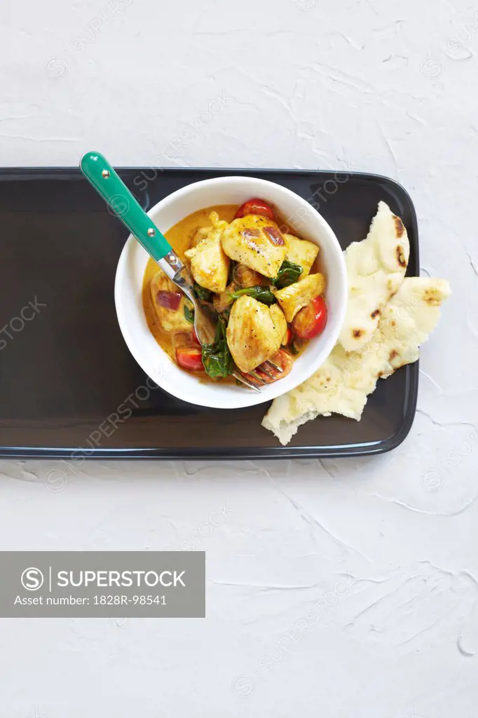 Overhead View of Chicken Curry with Naan Bread, Studio Shot,06/15/2012