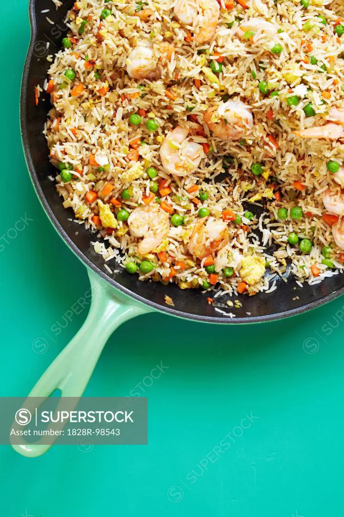 Overhead View of Shrimp Fried Rice in Skillet with Peas, Carrots and Egg, Studio Shot,06/15/2012