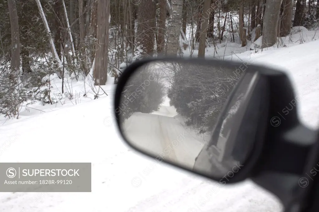 Snow Covered Road in Side-view Mirror of Car, Newmarket, Ontario, Canada. 01/02/2013