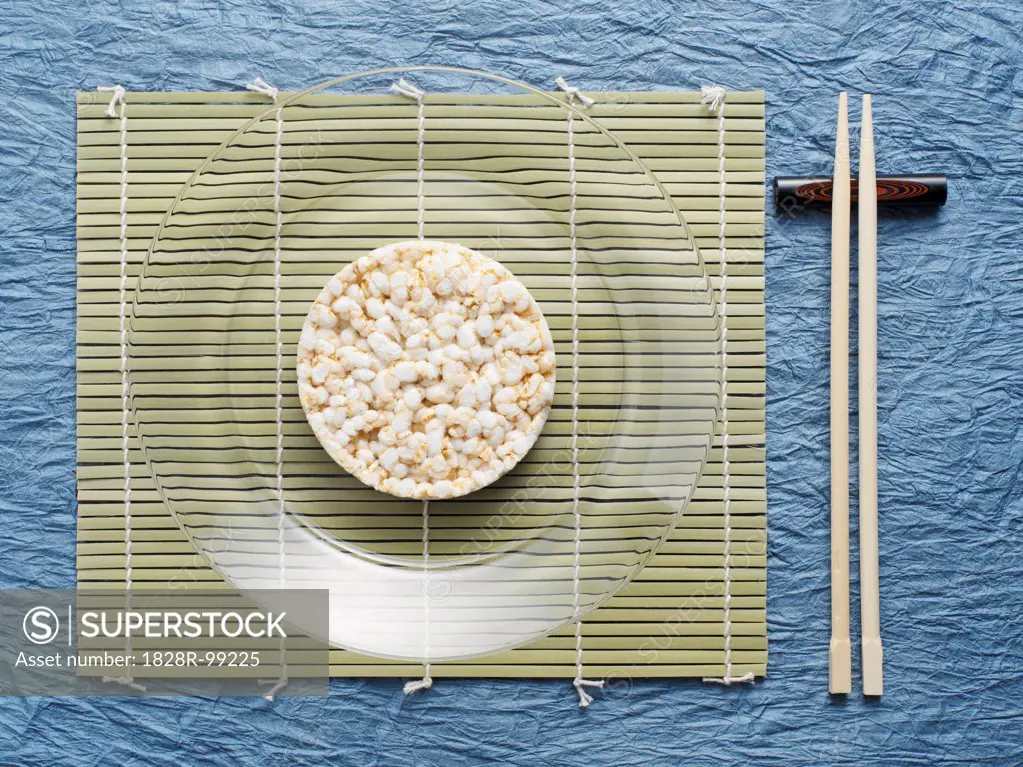 Overhead View of Rice Cake on Plate with Chop Sticks, Studio Shot. 09/15/2013
