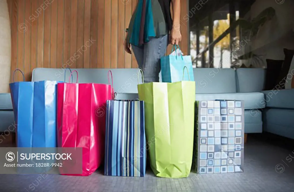 Woman Surrounded By shopping Bags   