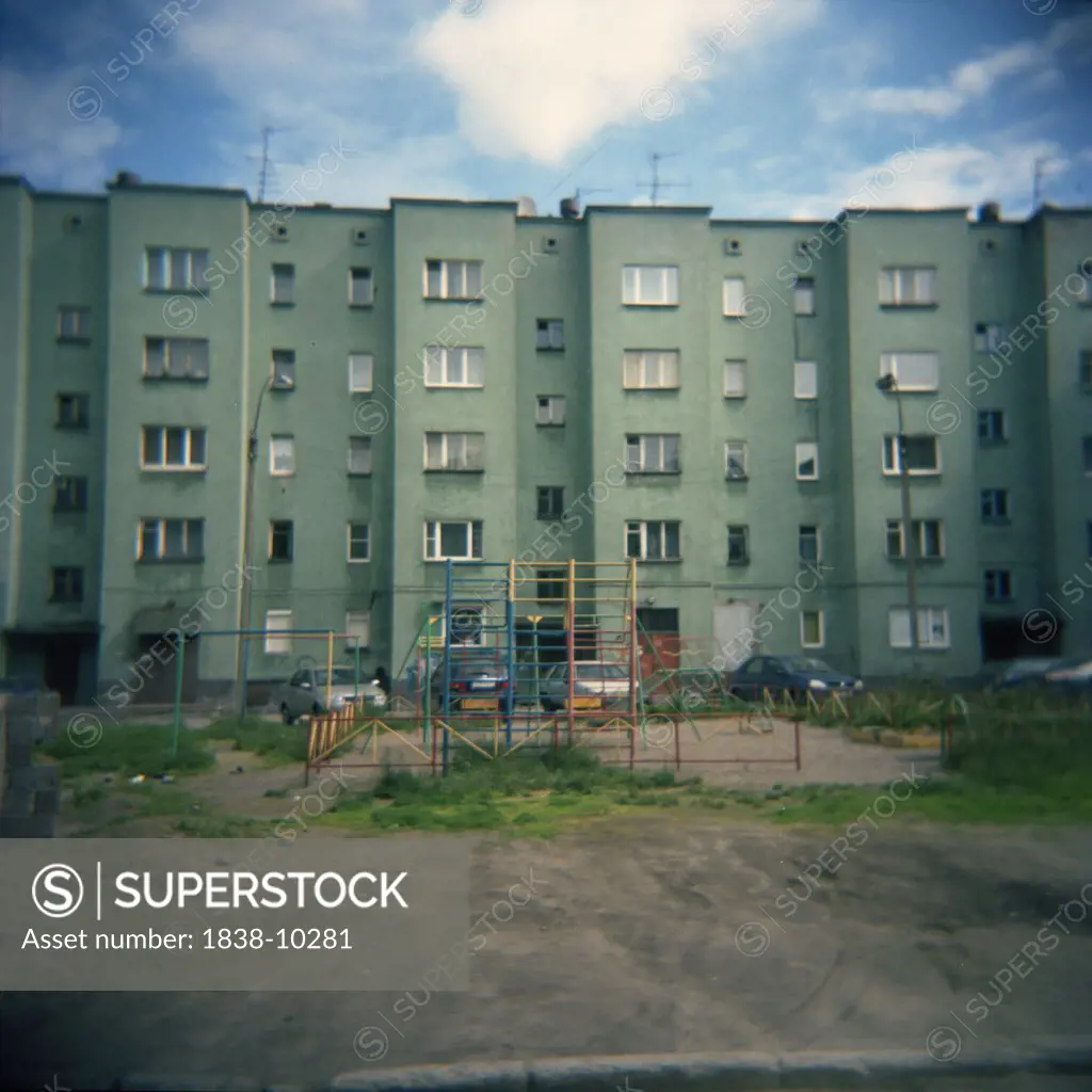 Apartment Building and Rundown Playground, Murmansk, Russia, 